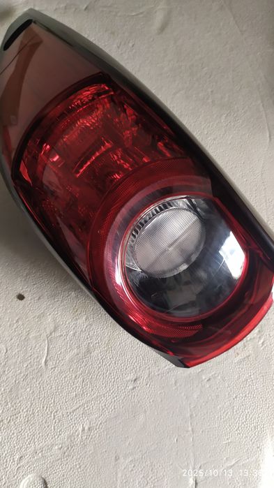 Фонар задній лівий Мазда.