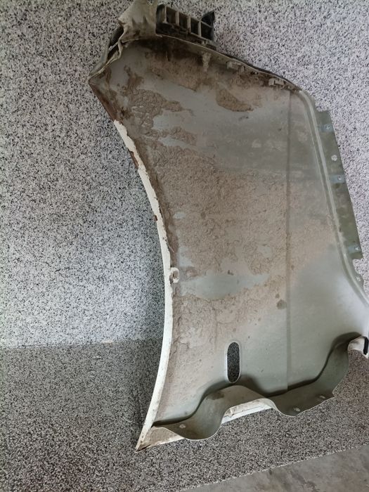 Błotnik prawy VW transporter T5 brak kodu lakieru