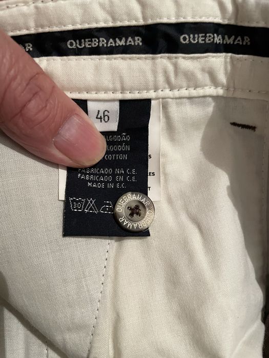 Calças castanhas quebramar