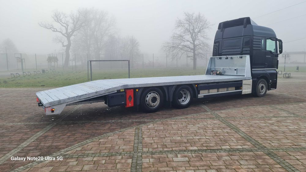 Najazd platforma ciężarowe trzyośka zabudowa laweta MAN TGM Hydraulika