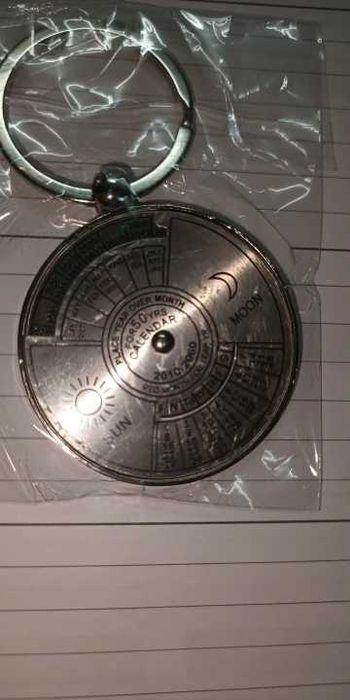 Брелок - календар на 50 років зі срібла, обертовий механізм