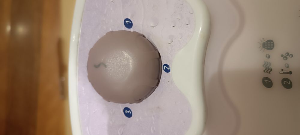 Massajador de pés a água