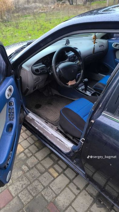 Автомобіль Мазда Кседос 6