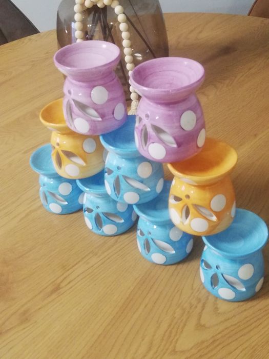 9 porta velas em loiça novos