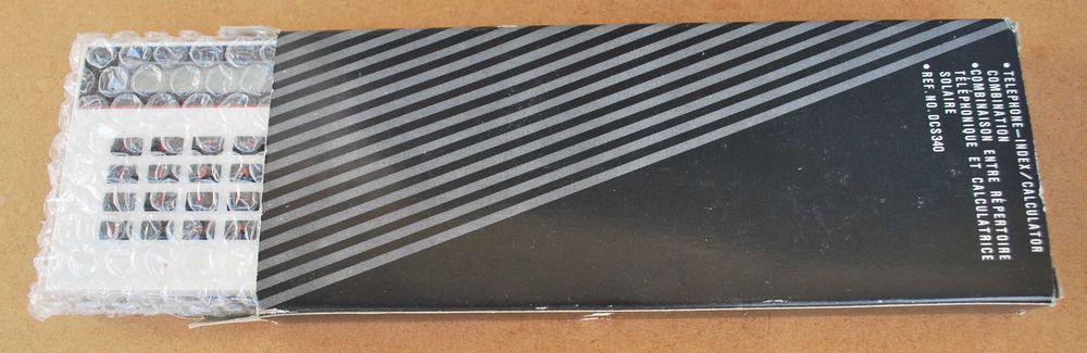 Agenda telefónica com calculadora solar dos anos 80