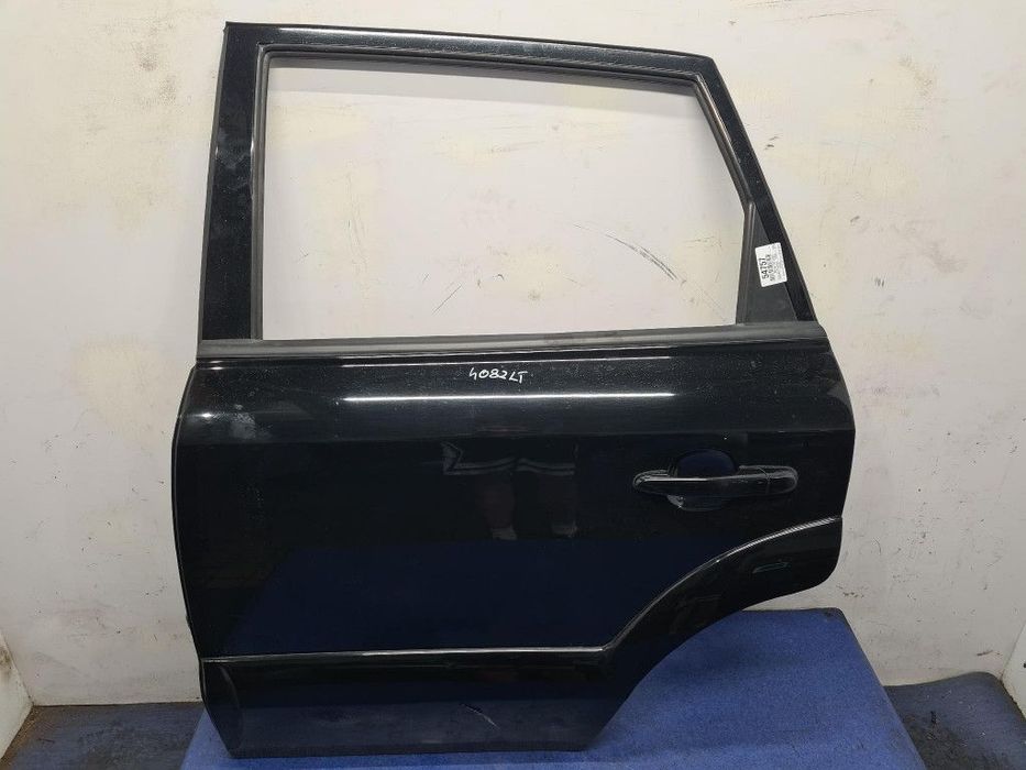 HYUNDAI TUCSON I DRZWI TYŁ LEWE  EB