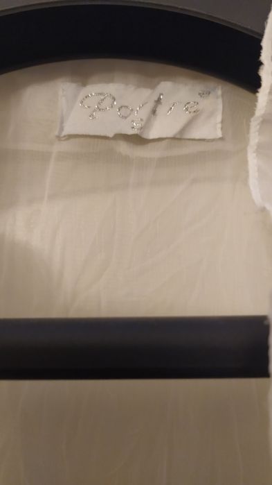 Biała, elegancka koszula.