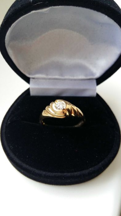 Pierścionek złoto 14 K 585 brylant 0,18 certyfikat R 17/18 mm W.3,20 g