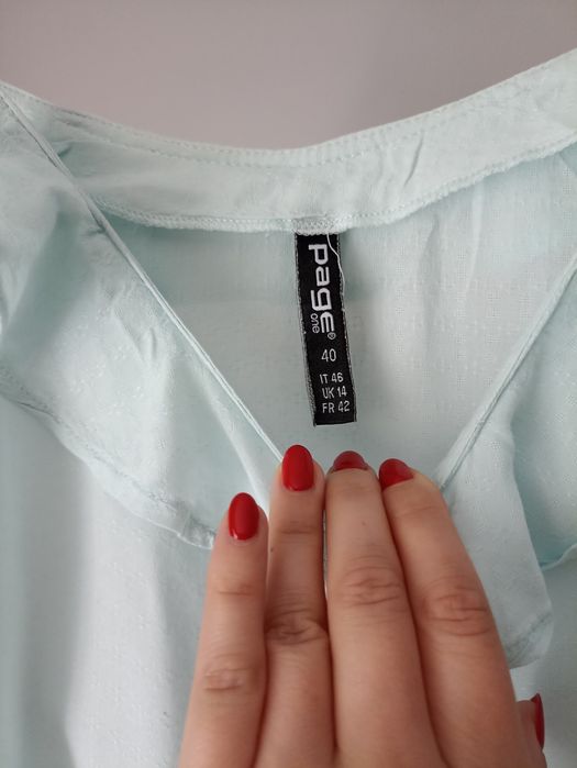 Top z falbanką Takko Fashion rozmiar 40