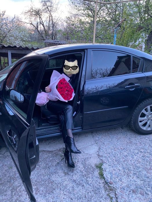 Машина Mazda 3