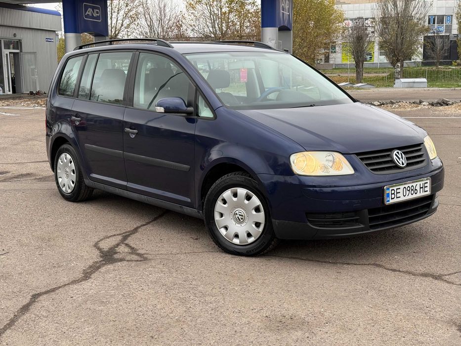 Продам VOLKSWAGEN Touran 2004р 1.6бенз 7-мест