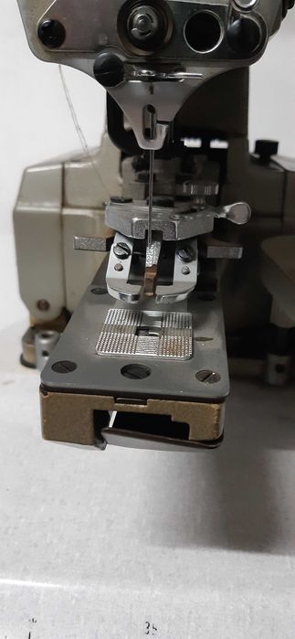 Máquina pregar botões