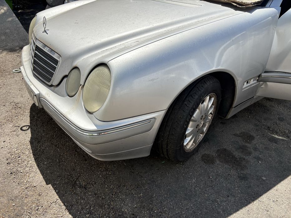 Guarda lamas esquerdo Mercedes Classe E W210