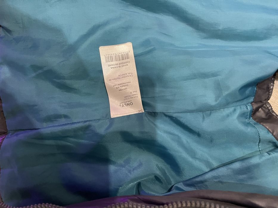 Жіноча жилетка тепла