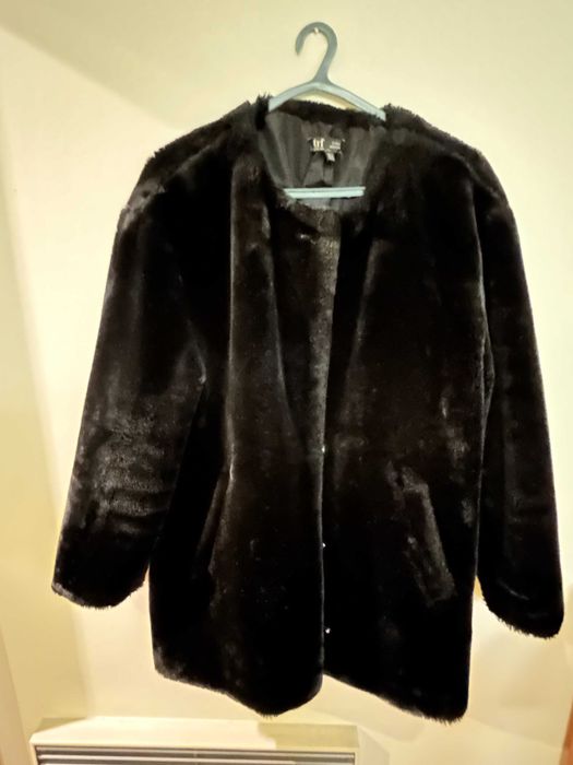 Casaco de pelo preto