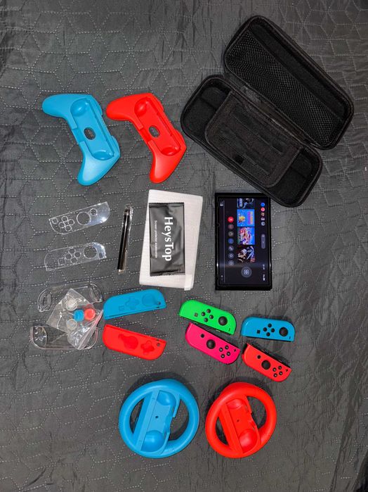 Nintendo Switch OLED + 4 JoyCon + Dużo akcesorii