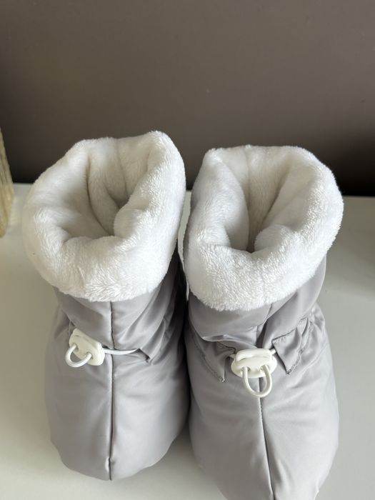 Чобітки для немовлят, топіки