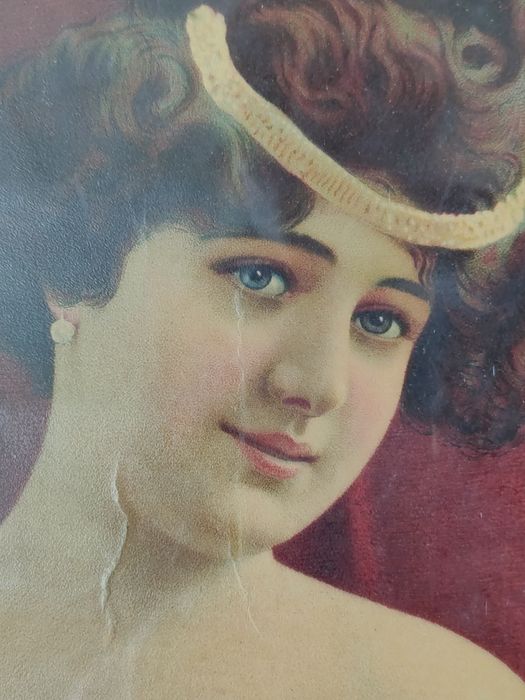 Moldura antiga em madeira.