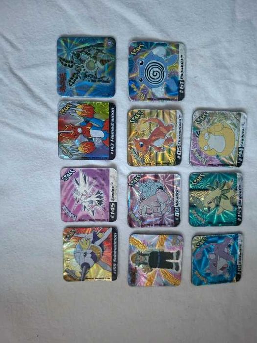 Lot of 11 assorted Pokémon, Yu-Gi-Oh, and Digimon stacks