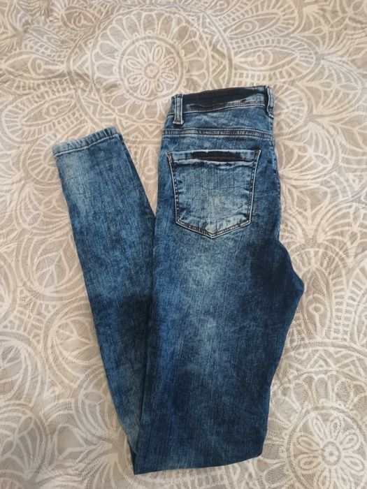 Damskie jeansy Reserved