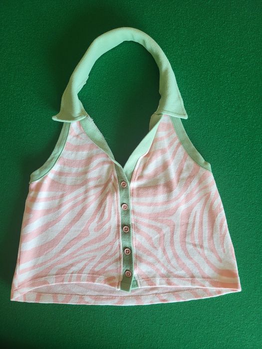 Top halter zebra różowy M/L Y2K stan bardzo dobry

Założony tylko kilka razy, stan bardzo dobry.

Rozmiar: M/L