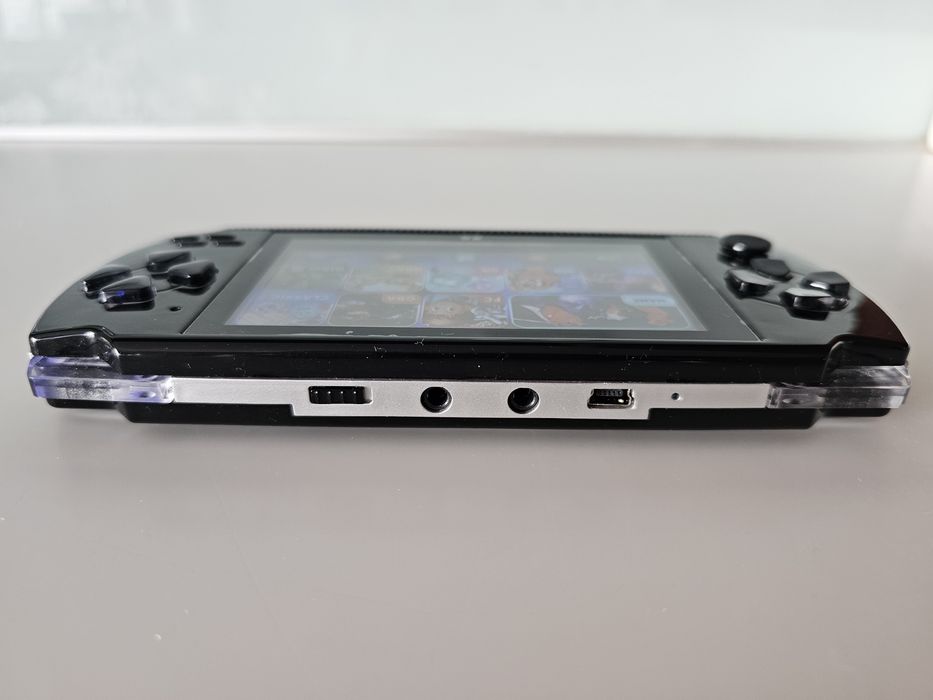 Consola de jogos portátil com bolsa