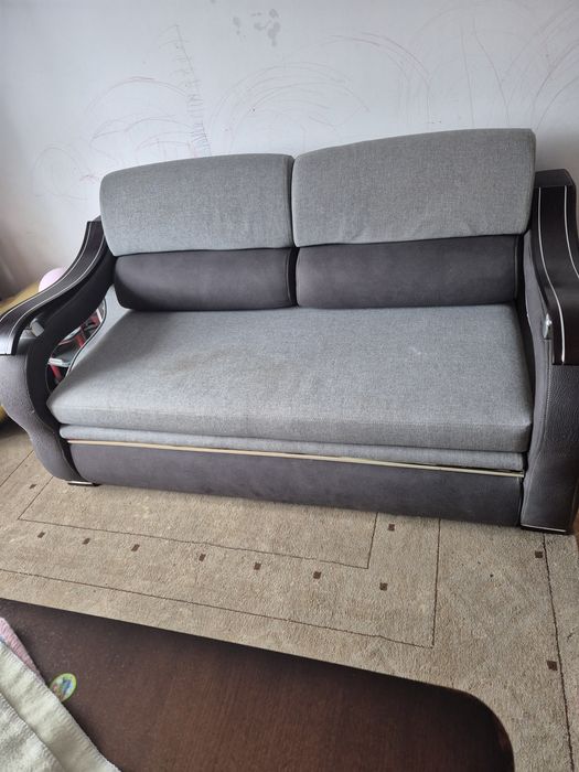 Sofa z sankcja spania plus pufa