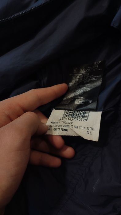 Пуховик Prada Re-Nylon.