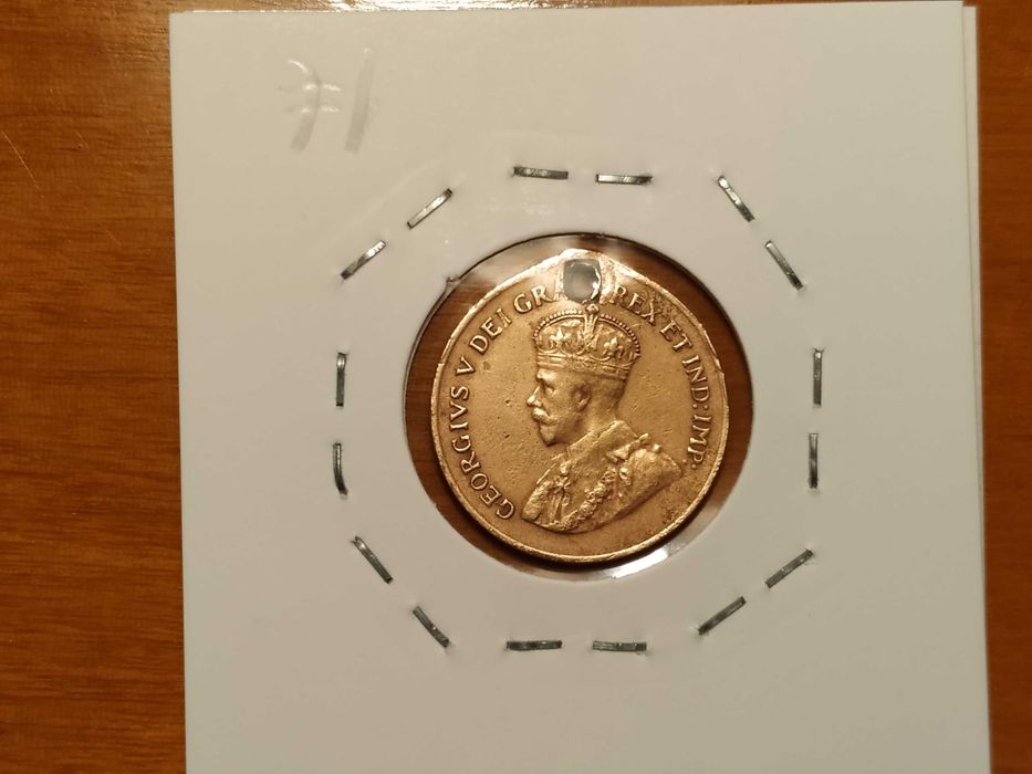 Canadá - moeda de 1 cêntimo de 1928 (com um furo)