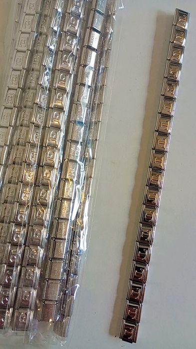 Lote 50  em aço pulseiras anéis e brincos