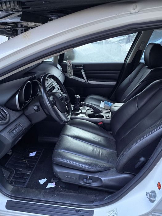 Є запчастини Mazda CX7 2007-2013