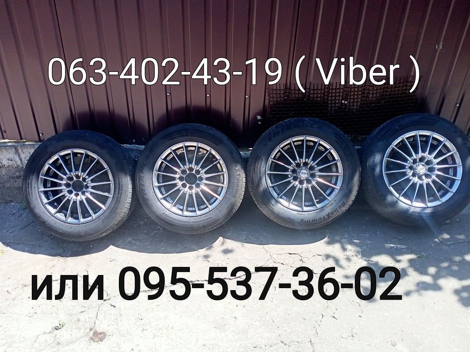Продам колеса в сборе на литых дисках  R14 разболтовка ( 4*98-4*100 )Вылет ET35 мм DIA 67.1 mm