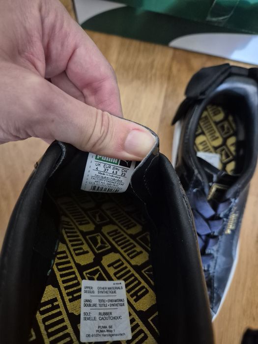 Ténis pretos Puma com laço