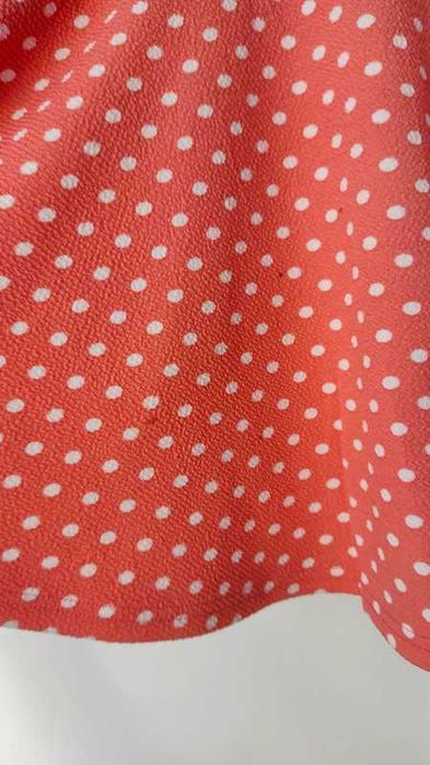 Pomarańczowa spódniczka w kropki Sinsay