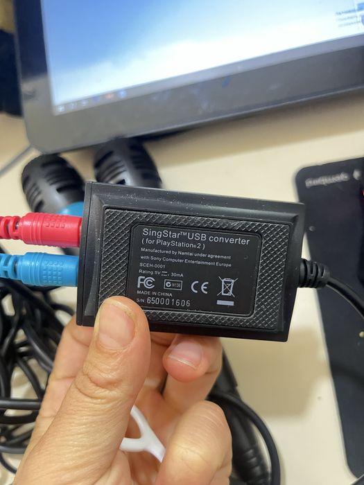 Мікрофони Sony SingStar (модель SCEH-0001) із фірмовим USB-адаптером