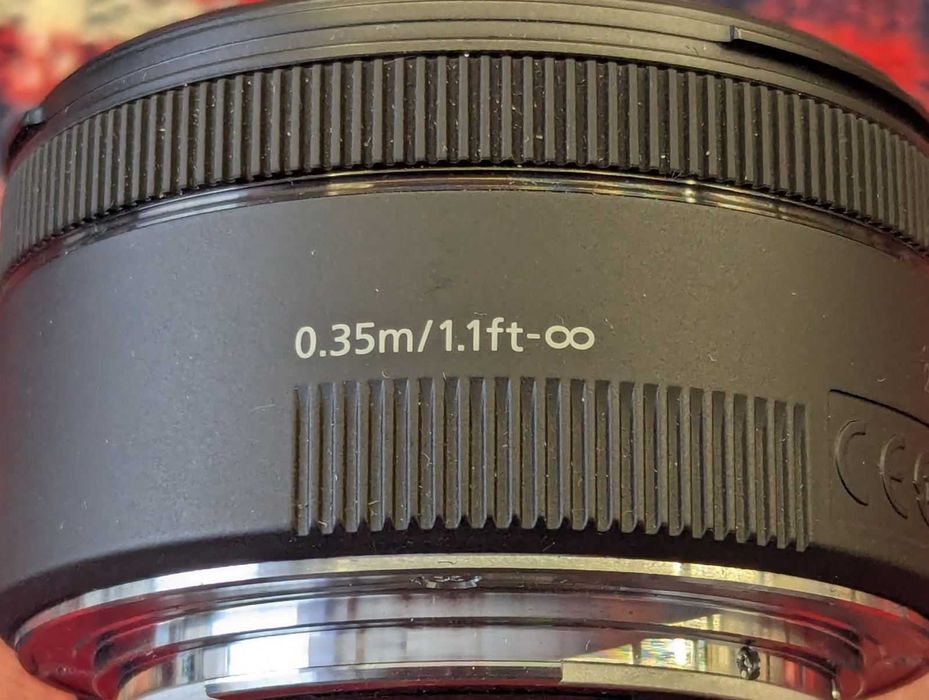 объектив Canon EF 50mm f1.8 STM