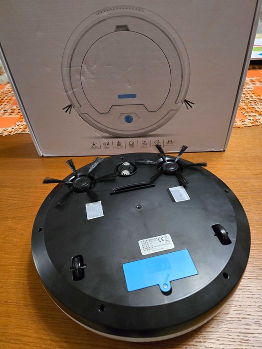 Aspirador / Robot de Limpeza.  Vai na caixa original e carrega via USB