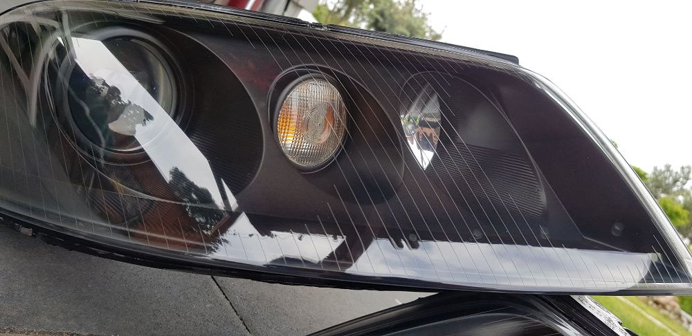 Reflektory Lampy Bi-Xenon Passat b5 fl P+L Hella EU