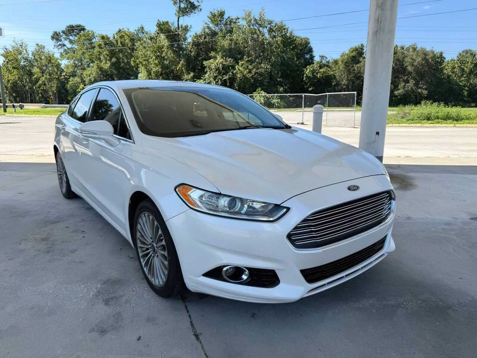 Ford Fusion Titanium Hybrid      2014