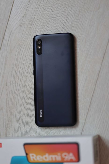 Telefon Xiaomi Redmi 9A granat 64 GB +  etui, szkło i ładowarka słuchawki jbl
