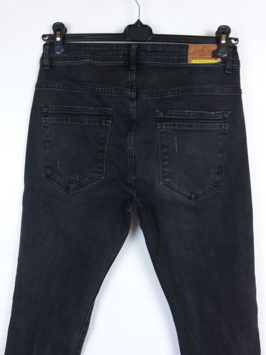 ZARA spodnie jeans z dziurami - 42 mex.32