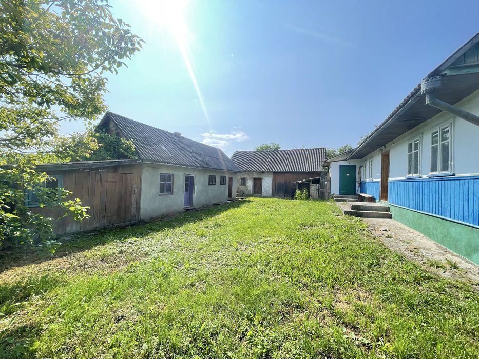 Будинок з приватизованою земельною ділянкою