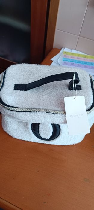 Porta retratos e bolsa