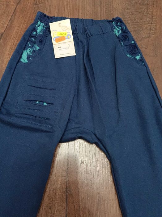 Spodnie dla dziewczynki w rozmiarze 122 Nowe