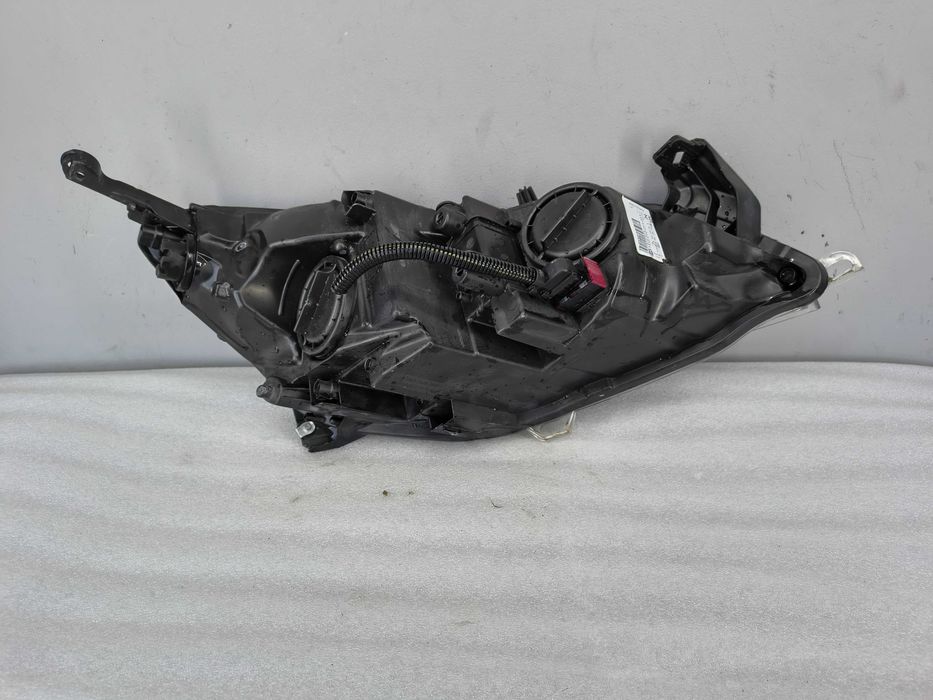 Lampa reflektor Lewy Opel Astra J IV