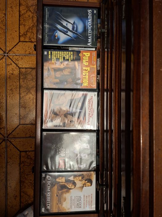 55 DVD alguns ainda enpacotados