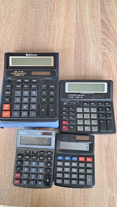 Калькуляторы 4 шт .
