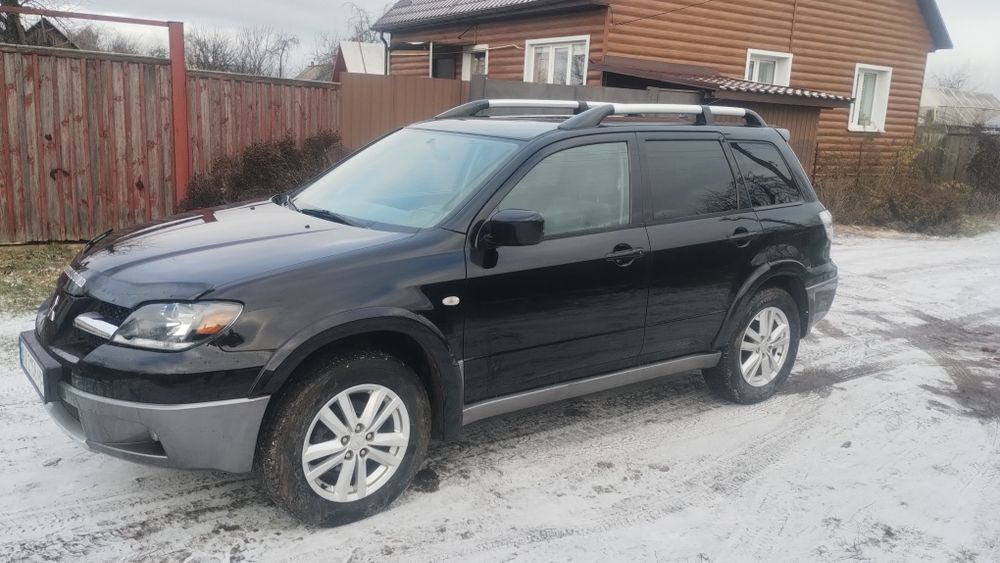Аутлендер 2.4 бензин