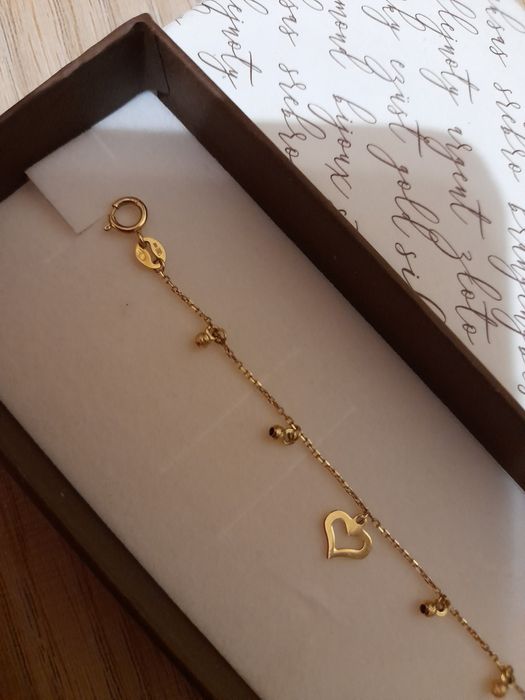 Nowa zlota bransoletka próba 585 z zawieszkami charms serduszka kulki