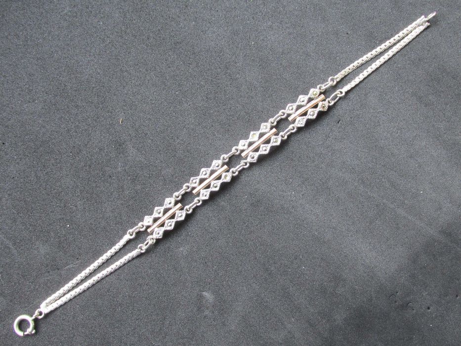 Pulseira antiga, prata contrastada e ouro, cravejada com marcassitas